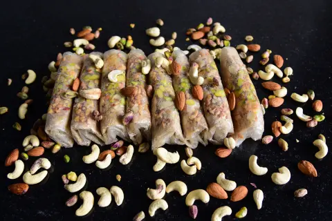Jaggery mixed dry fruits putharekulu